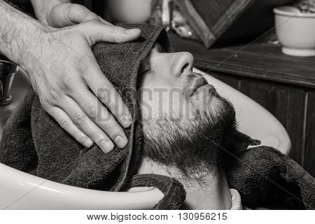 Haircut men Barbershop. Men's Hairdressers; barbers.Cute business man in a nice suit.