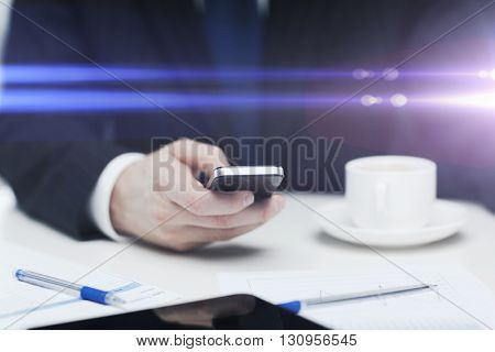 business, technology and interent concept - businessman with smartphone reading news