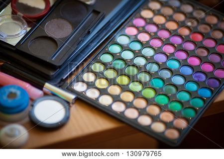 Bright colorful makeup palette, eyeshadow, close up