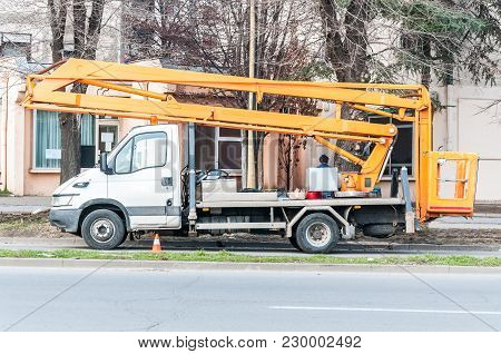 Electrification Service Vehicle Truck With Elevator Bucket On The Street Light Reconstruction Site