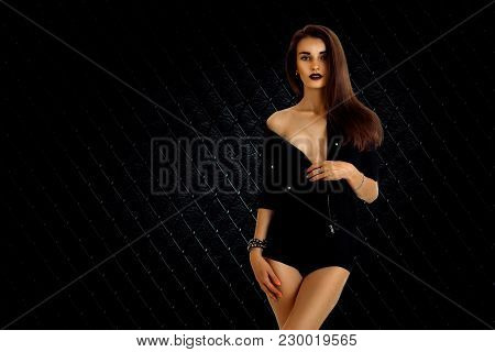 Charming Slim Woman In Black Jacket And Panties Looking At The Camera Isolated On White Background