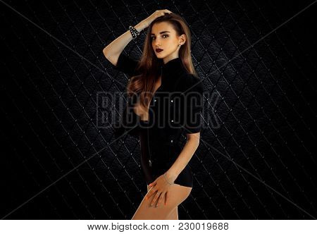 Slender Lovely Girl Posing In Front Of The Camera In Erotic Dress With Dark Lipstick On Lips Isolate