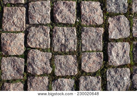 Texture Of Stone Setts With Moss In Joints