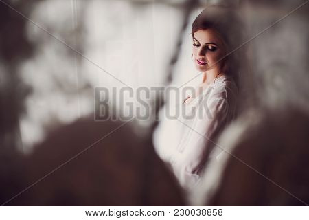 Night Wedding Ceremony. The Bride And Groom Hugging On Sea Pier
