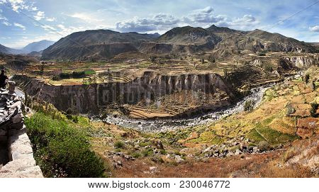 The Colca Canyon In Peru In Arequipa Departement - View Of Terraced Fields And Colca River
