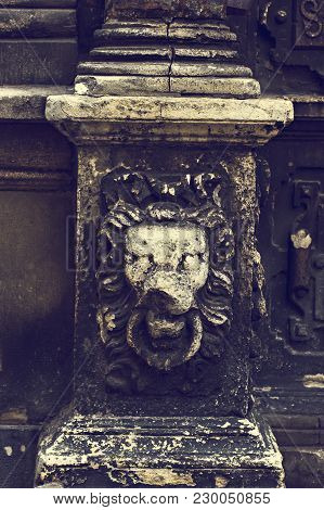Element Decor On The Old House. Statue Of A Lion On A Column Of A House