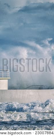 Storm - Threatening Waves And Pier In Kolobrzeg