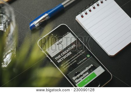 Malaga, Spain - March 6, 2018: Mobile Phone With Ello App In The Screen, Placed On A Black Desk With