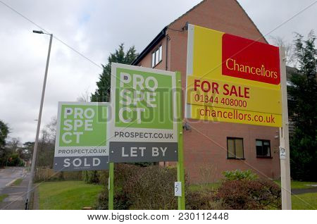 Bracknell, England - March 08, 2018: Estate Agent Signs Advertising Property For Sale, Sold Or To Le