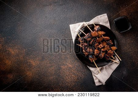 Grilled Beef Liver On Skewers, With Teriyaki Or Soy Sauce, Yakitori, Dark Rusty  Table Copy Space To