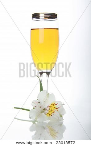 Goblet With Wine And White Orchid