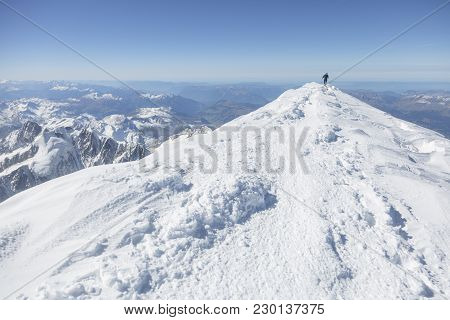 Mountaineering Ascending To The Top Of Mount Mont Blanc In French Alps. Chamonix, France