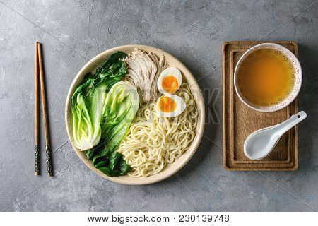 Ingredients For Cooking Asian Dish Udon Noodles With Boiled Egg, Mushrooms, Boc Choy, Broth Served I