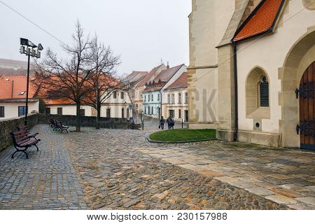 Cobbled Square With The Deanery Church Of St. Nicholas In The Historical Centre Of Znojmo, Czech Rep
