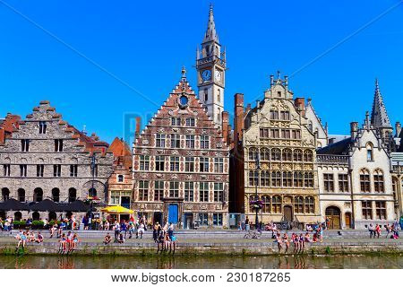 Gent - May 26: Unidentified Tourists Visiting Historical Center Of Gent With Gabled Houses Along Can