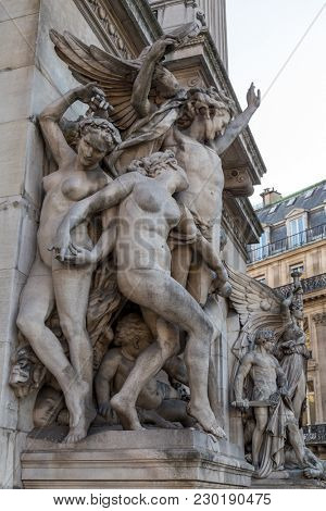 Architectural details of Opera National de Paris: Dance Facade sculpture by Carpeaux. Grand Opera (Garnier Palace) is famous neo-baroque building in Paris, France - UNESCO World Heritage Site.