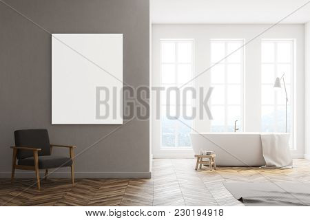 Minimalistic Bathroom Interior With Tall Windows, White Walls, A Wooden Floor And A White Bathtub. A