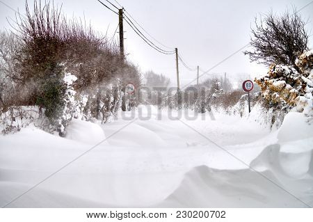 Bannow County Wexford Ireland In March 2 2018; Extreme Weather Snowdrift On The Road.