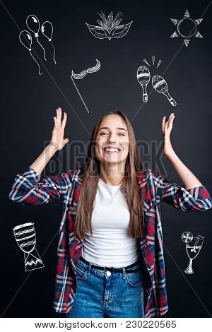 Amazing Holidays. Cheerful Emotional Young Woman Smiling And Feeling Excited While Waiting For Her U