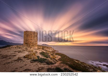 Dramatic Sunset At Punta Spanu On The Coast Of Corsica