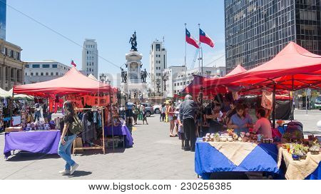 Valparaiso, Chile - January 2, 2018: Street Market With People Walking, In Sotomayor Square, On The 
