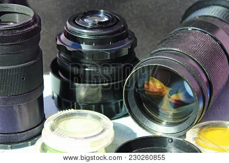 Photographic Lens Photofilters And Other Photo Accessories. Photoalbum. Retro Photo Objectives