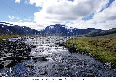 Lake,river And Mountain In National Park In Norway