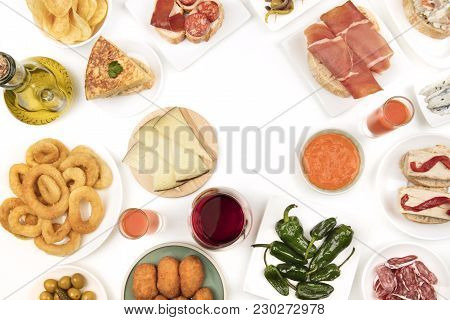 An Overhead Photo Of A Collection Of Spanish Tapas Food, Shot From Above On A White Background, Form