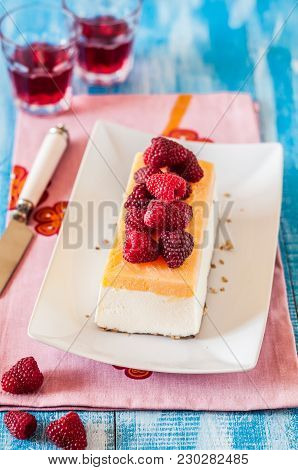 Lemon Curd Semifreddo, Ice Cream Cake Decorated With Fresh Raspberries And Mint, Copy Space For Your