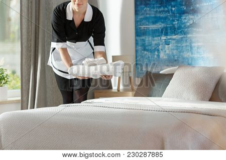 Housekeeper In Black Uniform