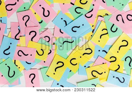 Colorful Paper Notes With Question Marks. Closeup.