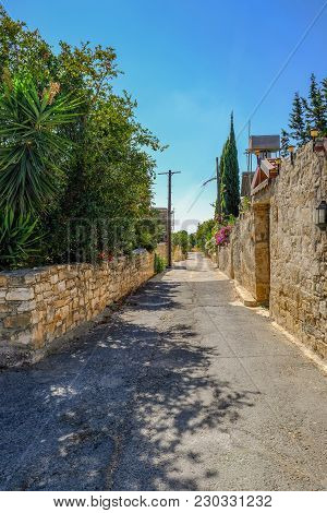 Street View In A Typrical Cypriot Village With No People. Taken In The Morning Of This Narrow Villag