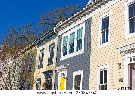 Historic Houses In Shaw Neighborhood On A Quiet Street. Colorful Townhouses Before Sunset In Washing
