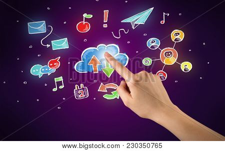 Female hand toucing mixed media icons with purple background
