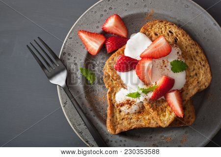 french toasts with yogurt and strawberries for breakfast