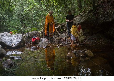 KOH CHANG, THAILAND - MAR 9, 2018: During Christian sacrament of spiritual birth - Baptism. There are currently 10 Orthodox parishes in Thailand, Orthodoxy is practiced by 0.002% of population.