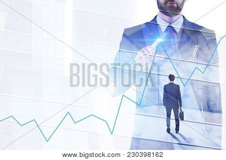 Businessman Pointing At Forex Chart On Abstract City Background. Meeting, Teamwork And Investment Co