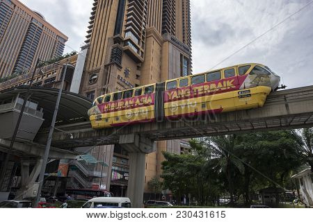 Kuala Lumpur, Malaysia - December 31,2017 : Kl Monorail Train Passing Through Berjaya Times Square S