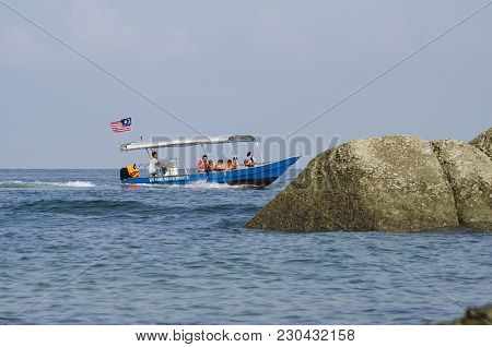 Pangkor Island, Malaysia - 17 December 2017 : Group Of Tourist Enjoy Exploring Pangkor Island Locate