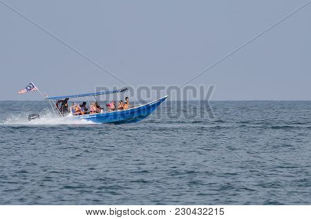 Pangkor Island, Malaysia - 17 December 2017 : Group Of Tourist Enjoy Exploring Pangkor Island Locate