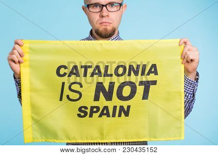 Man With Pro-independence Flag. Referendum For The Separation Of Catalonia From Spain Concept.