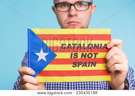 Man With Pro-independence Flag. Referendum For The Separation Of Catalonia From Spain Concept.