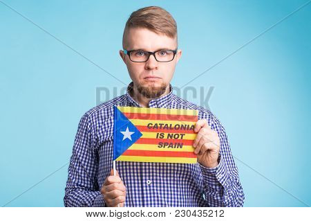 Man With Pro-independence Flag. Referendum For The Separation Of Catalonia From Spain Concept.