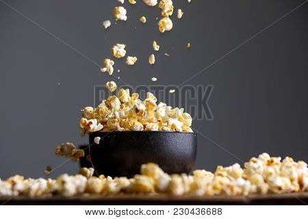 Levitating Popcorn Around A Ceramic Cup.