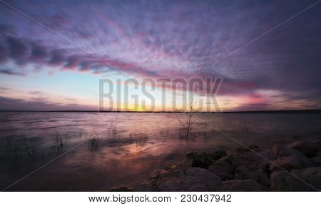 Amazing Multicolored Sunset Over Benbrook Lake In Fort Worth, Tx