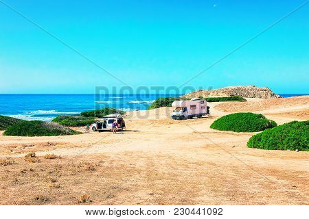Car And Camper At Capo Pecora Resort At The Mediterranean Sea, Sardinia, In Italy
