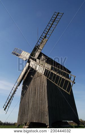 Old Mill On A Green Field Spring