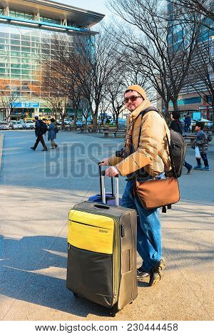 Busan, South Korea - March 12, 2016: Passenger With Lugagge Bags At The Railway Station In Busan, So