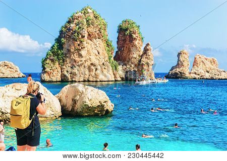 Scopello, Italy - September 17, 2017: People Swimming At Beach Of Scopello, In The Mediterranean Sea