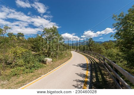 Bicycle Path In The Sarca Valley (valle Del Sarca) Through The Forest. Trentino Alto Adige, Italy, E